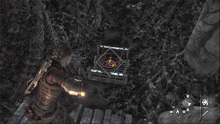 Find the cart at the bottom and set its basket on fire using Ignifer - A Plague Tale Requiem: Chapter 11, Open the gate - walkthrough - Chapter 11 - The Cradle of Centuries - A Plague Tale Requiem Guide, Walkthrough