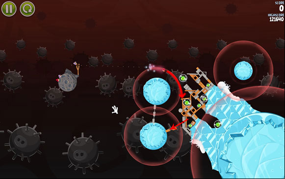 Launch the first bird in such a way that the end of the flight path enters the gravity field - Level 3-19 - Danger Zone - Angry Birds Space - Game Guide and Walkthrough
