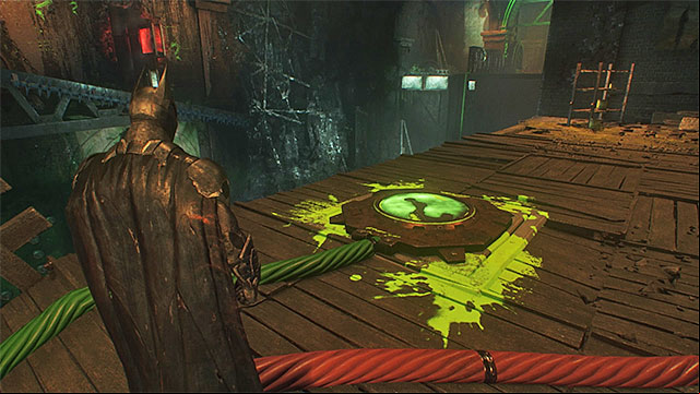 Turn right, use the blockade to extend the platform closer to you and park the batmobile there - Second Riddler trial | Batman Arkham Knight - Riddlers Revenge - Batman: Arkham Knight Game Guide & Walkthrough