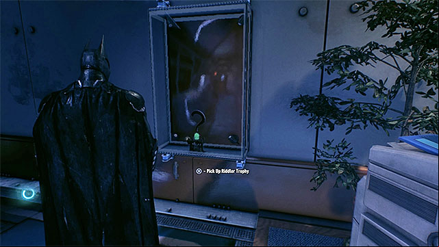 Break the glass and take the trophy - Riddler trophies in GD Lockup | Collectibles - GD Lockup - Collectibles - GD Lockup - Batman: Arkham Knight Game Guide & Walkthrough