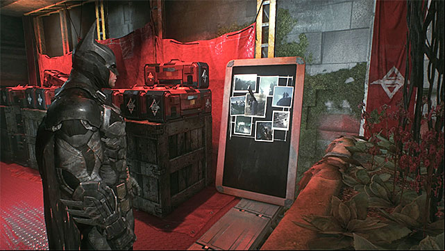 Find the board next to the weapons crate - Riddles in the Arkham Knight HQ | Collectibles - Arkham Knight HQ - Collectibles - Arkham Knight HQ - Batman: Arkham Knight Game Guide & Walkthrough