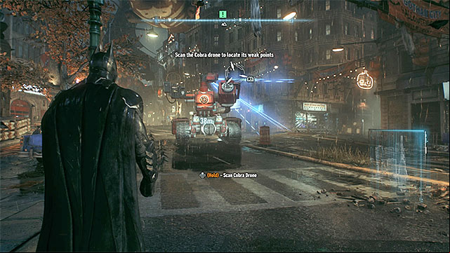 Scan separate parts of the tank while staying out of its range of fire - Scan the Cobra tank to discover its weakness | Main story | Batman Arkham Knight - Main story - Batman: Arkham Knight Game Guide & Walkthrough