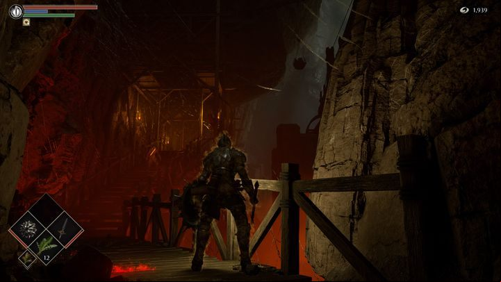 As you go on, watch out for the enemy upstairs because he will throw a boulder on the ground - Demons Souls Remake: Smithing Grounds(2-1) - walkthrough - Tunnel of the Stone Fang (Region 2) - Demons Souls Remake Guide
