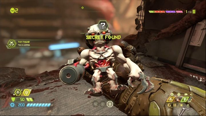 You will find the figurine on one of the ledges, near the destroyed building - Doom Eternal: Super Gore Nest secrets maps and location - Collectibles and secrets - Doom Eternal Guide