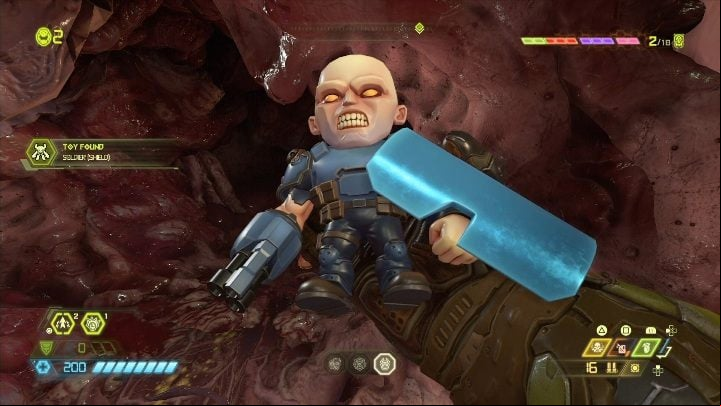 In the middle of the fleshy object you will find a figurine - Doom Eternal: Super Gore Nest secrets maps and location - Collectibles and secrets - Doom Eternal Guide