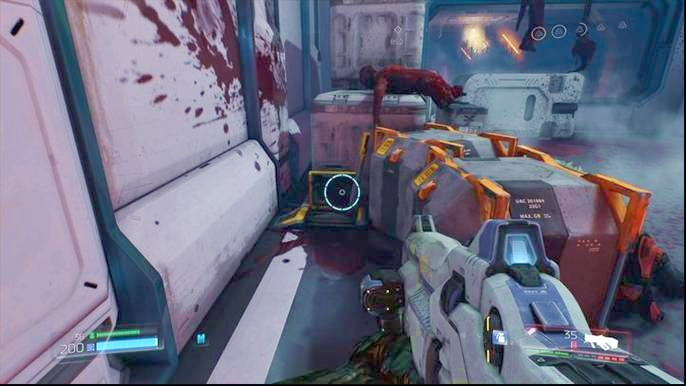 But before you jump down, first use the lever hidden behind the chests on the right - Doom: VEGA Central Processing Walkthrough - Walkthrough - Doom Game Guide & Walkthrough