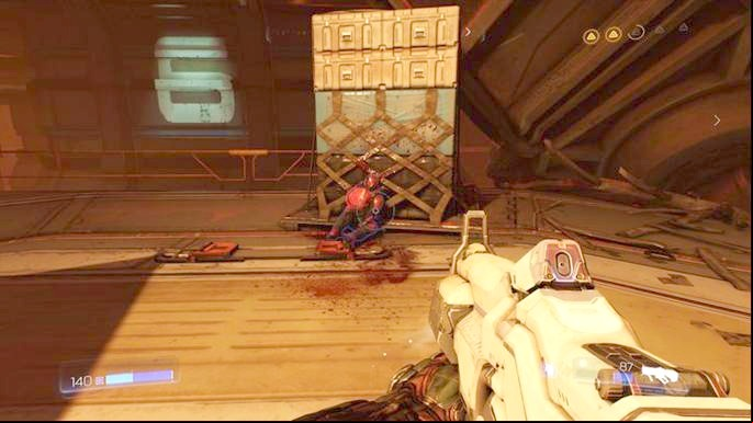 Soon after you receive the task to reclaim the yellow key, a large group of demons will appear - Doom: All secrets in Destroyed Argent Facility - Secrets - Doom Game Guide & Walkthrough