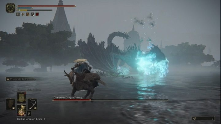 The dragon will also breathe fire while on the ground - Elden Ring: How to beat Glinstone Dragon Smarag? - Liurnia of the Lakes - Elden Ring Guide