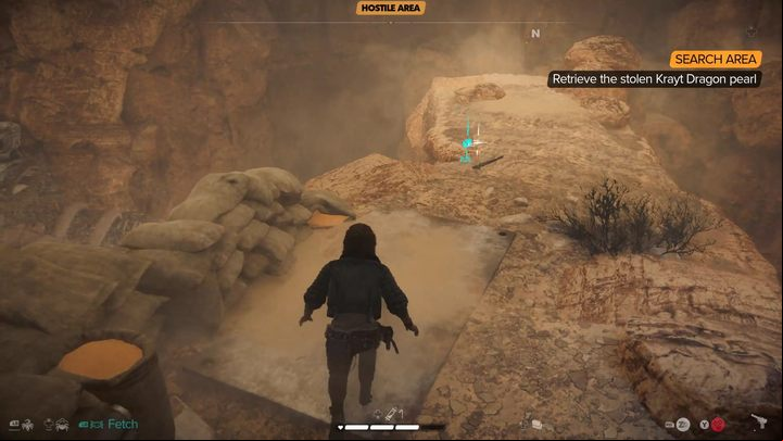 After the fight, go right to the upper floor of the cave, to the stone bridge where the sniper was standing - Star Wars Outlaws: The Heavy - walkthrough - Tatooine - Star Wars Outlaws Guide