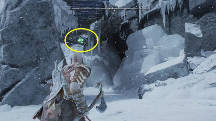 The bird is hiding in the remains of a wooden boat between the rocks - God of War Ragnarok: The Derelict Outpost, Midgard - secrets, collectibles - Midgard - God of War Ragnarok Guide