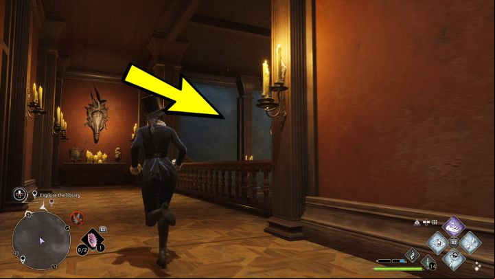 Descend through the stairs on the right, go through the room and descend through the next stairs - Hogwarts Legacy: How to explore the library in the Minding Your Own Business quest? - Combat and exploration - Hogwarts Legacy Guide