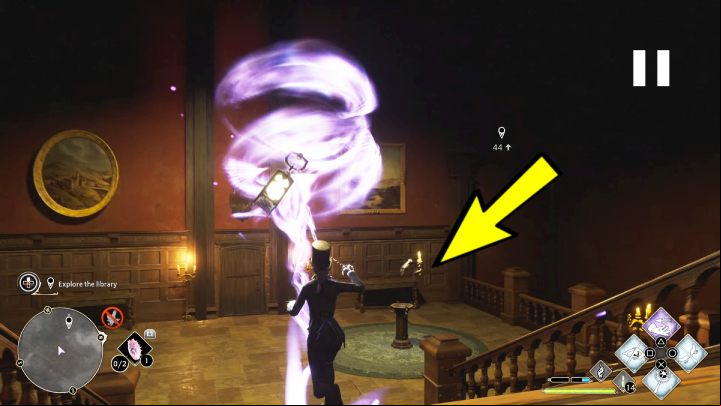 While carrying the lantern, go down the stairs and place it on the stand - Hogwarts Legacy: How to explore the library in the Minding Your Own Business quest? - Combat and exploration - Hogwarts Legacy Guide