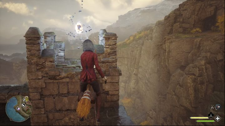 Switch to broom and fly to the top of the tower for the second object - Hogwarts Legacy: Ancient Magic Hotspots Part 2 - Highlands - Hogwarts Legacy Guide