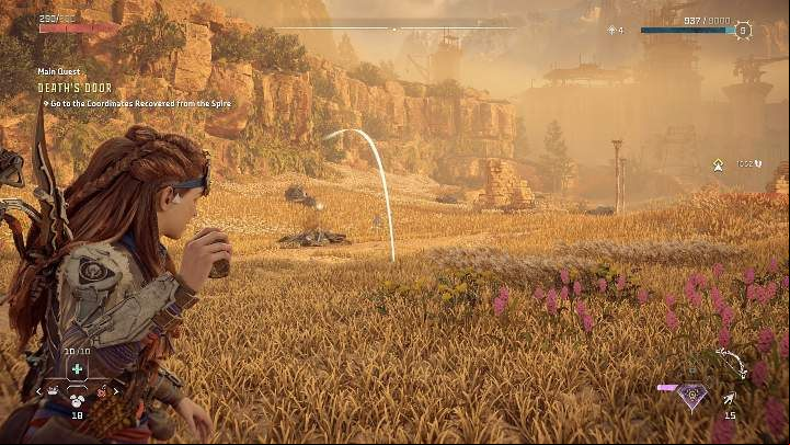 Press Down to make the throw's trajectory appear on the screen - Horizon Forbidden West: How to throw rocks? - Combat - Horizon Forbidden West Guide