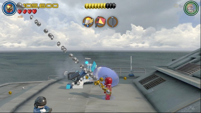 On the Helicarrier, on the roof where you found the flag you will locate a silver necklace - Stan Lee / Red brick - Shakespeare in the Park - secrets - LEGO Marvels Avengers - Game Guide and Walkthrough