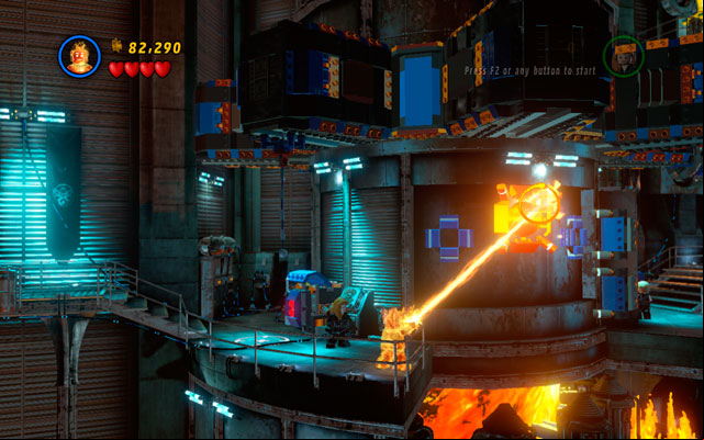 Melt the ball using Human Torchs fire beam, then switch back to Hawkeye and shoot an arrow at the uncovered gap - Red Head Detention | Walkthrough - Walkthrough - LEGO Marvel Super Heroes Game Guide & Walkthrough