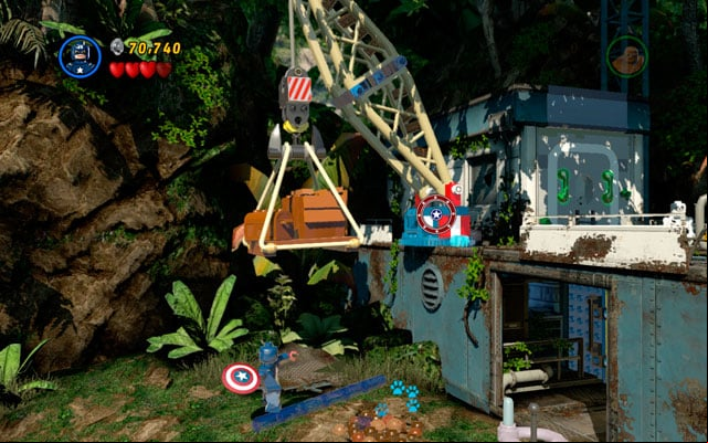 Toss a shield at the crane and climb on the platform using newly created age - Rapturous Rise | Walkthrough - Walkthrough - LEGO Marvel Super Heroes Game Guide & Walkthrough