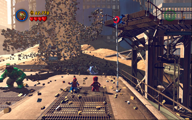 On the right side of the sand giant you will find silver obstacle, which only Iron Man can destroy - Sandman | Boss fights - Boss fights - LEGO Marvel Super Heroes Game Guide & Walkthrough