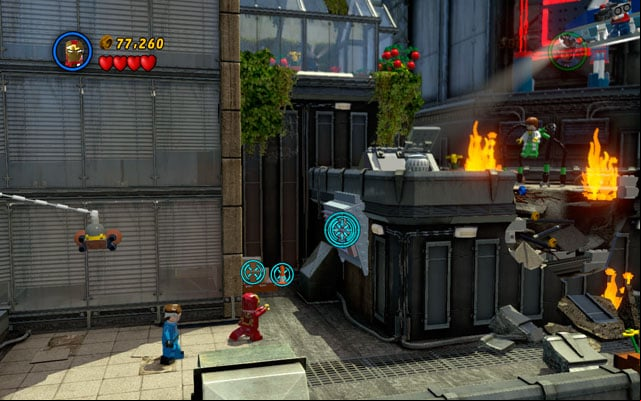 Standing vis-a-vis to the HOTEL neon choose Iron Man and shoot the rockets at the silver bar - Times Square Off | Minikit Sets - Minikit Sets - LEGO Marvel Super Heroes Game Guide & Walkthrough