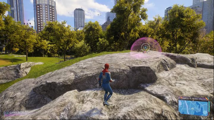 You'll find this Spider-bot on a large boulder in the middle of the park - Spider-Man 2: All Spider-bot locations - Secrets and Collectibles - Spider Man 2 Guide