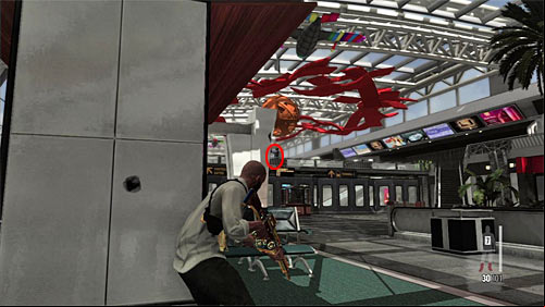 During travelling the first part of a terminal watch out for an enemy standing on the far bridge (screen) - Chapter XIV - p. 2 - Walkthrough - Max Payne 3 Game Guide & Walkthrough