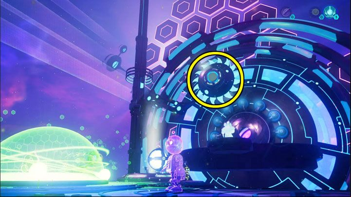 Remove the heavy sphere from the machine on the right (you can do this from a distance) and throw it at the fan marked on the picture, located directly in front of the meta-terminal - Ratchet & Clank Rift Apart: Repairing the anomaly and getting to the drill - walkthrough - Blizar Prime - Ratchet & Clank Rift Apart Guide