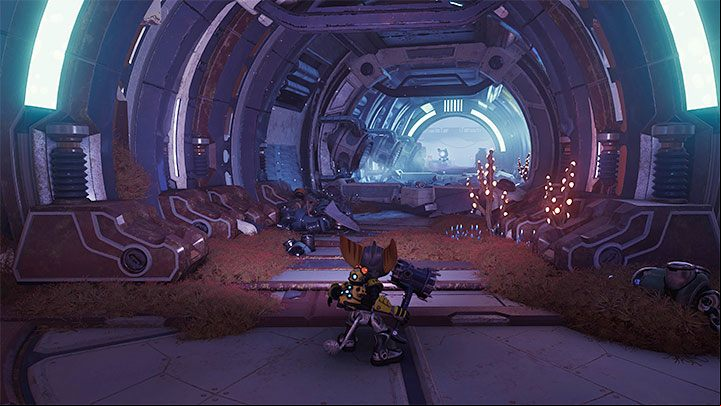 You can leave this room (the entire floor is now safe to land on) and follow the friendly Junk Bot down the main corridor to the south - Ratchet & Clank Rift Apart: Find the Rubion Forge - walkthrough - Cordelion - Ratchet & Clank Rift Apart Guide