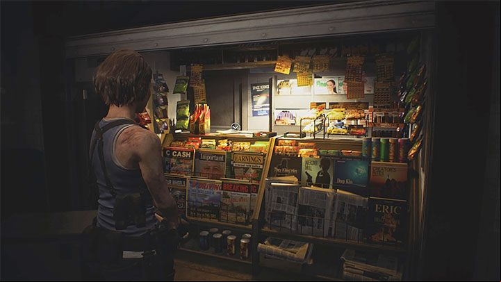 The newspaper is lying on the counter of the Newsstand, located at Redstone Street Station - Resident Evil 3: Redstone Street Station secrets, collectibles - Collectibles and secrets - Resident Evil 3 Guide