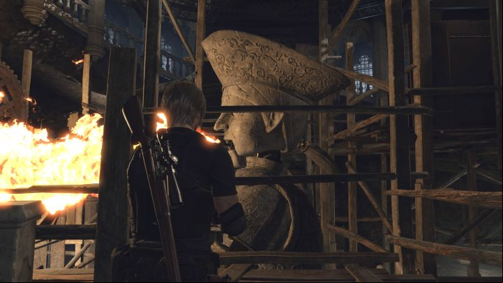The first type of traps are rotating stone statues that spit fire - Resident Evil 4 Remake: How to avoid traps in the Clock Tower? - Campaign - Resident Evil 4 Remake Guide