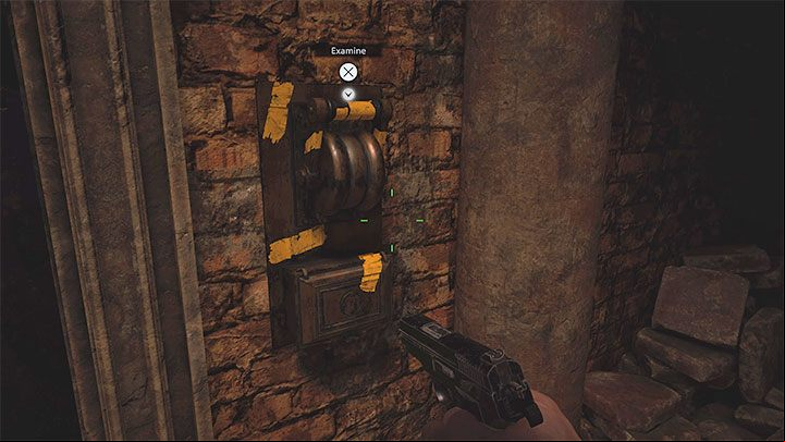 Ethan can use the path towards the castle after solving the gate puzzle in the Graveyard in the village that requires you to place 2 crests in it - Resident Evil Village: A Mine - walkthrough - Village - 1st visit - Resident Evil Village Guide