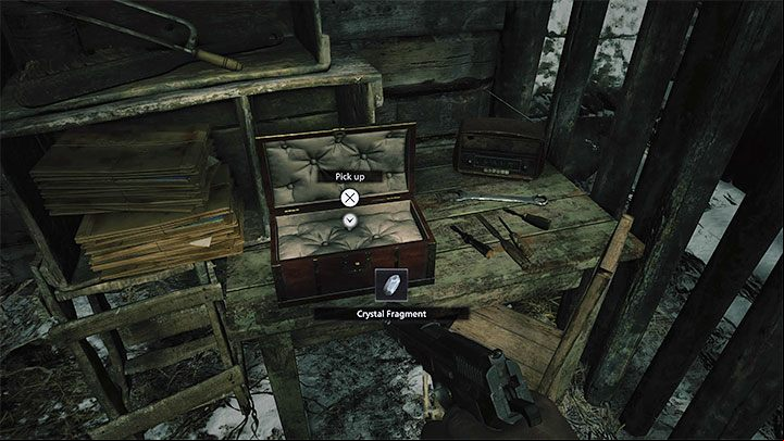 The crystal is in a small chest that you will find while exploring the reservoir, specifically after heading out of the Guardhouse towards the Windmills - Resident Evil Village: Reservoir - Files, list - Beneviento House - Resident Evil Village Guide