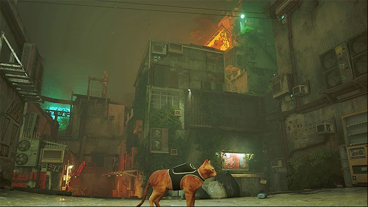 The slums is the first semi-open location and you'll encounter it for the first time relatively early in the game - in Chapter 4 - Stray: Beginners guide - Basics - Stray Guide, Walkthrough