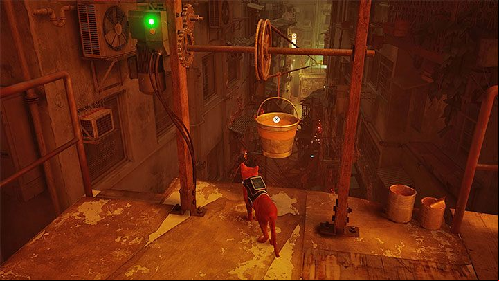 You will find a bucket, which allows a long descent - Stray: The Flat, Chapter 3 - walkthrough - Walkthrough - Stray Guide, Walkthrough
