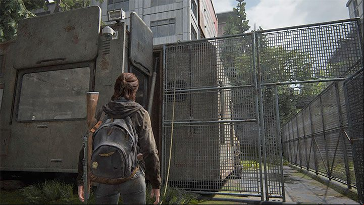 The cable must hang on the fence on the other side of the command center after the throw is made - this is shown in the picture - The Last of Us 2: The Gate - collectibles, artefacts, coins - Seattle Day 1 - Ellie - The Last of Us 2 Guide