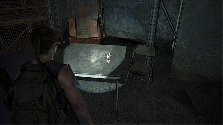 The secret lies on a square table in a dark warehouse - The Last of Us 2: On Foot - collectibles, artefacts, coins - Seattle Day 1 - Abby - The Last of Us 2 Guide