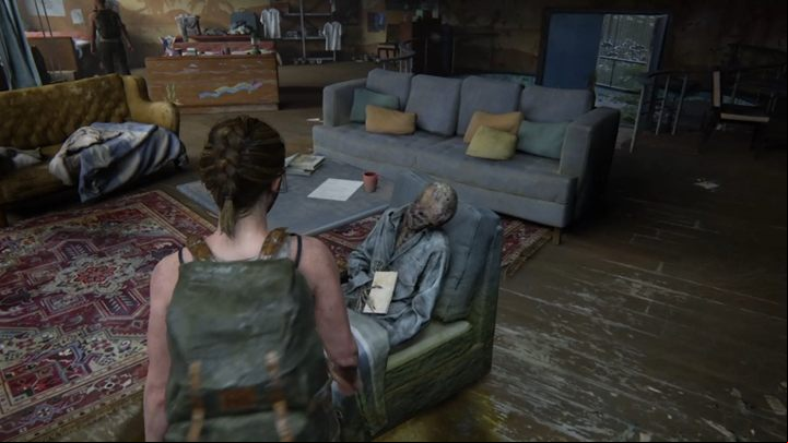 Go up the stairs and pull a note out of the skeletons hand - TLoU2: The Forward Base/The Aquarium, Seattle Day 1 Abby walkthrough - Seattle Day 1 - Abby - The Last of Us 2 Guide