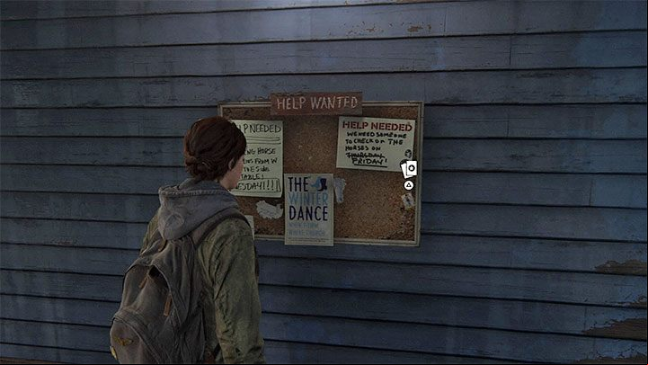 The secret is attached to one of the bulletin boards on the wall of the building with a blue elevation - The Last of Us 2: Waking Up - collectibles, artefacts, coins - Jackson - The Last of Us 2 Guide