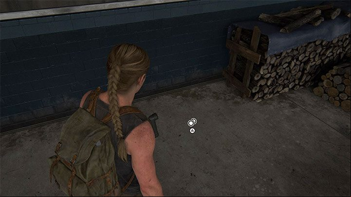 Before you go further, pick up the coin lying on the ground - The Last of Us 2: The Stadium - collectibles, artefacts, coins - Seattle Day 1 - Abby - The Last of Us 2 Guide