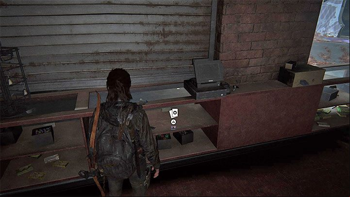 The card is under the counter - The Last of Us 2: The Flooded City - collectibles, artefacts, coins - Seattle, Day 3 - Ellie - The Last of Us 2 Guide