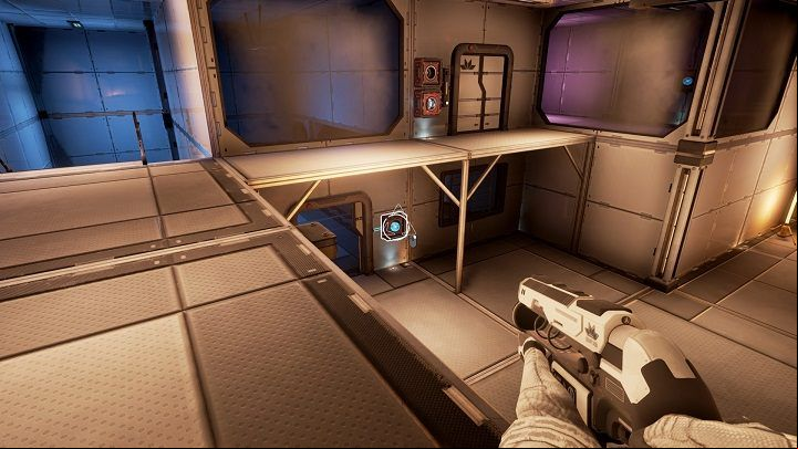 Put it in one of two available spots near the door to the pink room - Chapter 2 | Walkthrough - Walkthrough - The Turing Test Game Guide