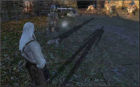 Take the Rusty Sword from a dummy nearby and approach the battling characters - Kaer Morhen Courtyard - part 1 | Walkthrough - Prologue - The Witcher Game Guide & Walkthrough